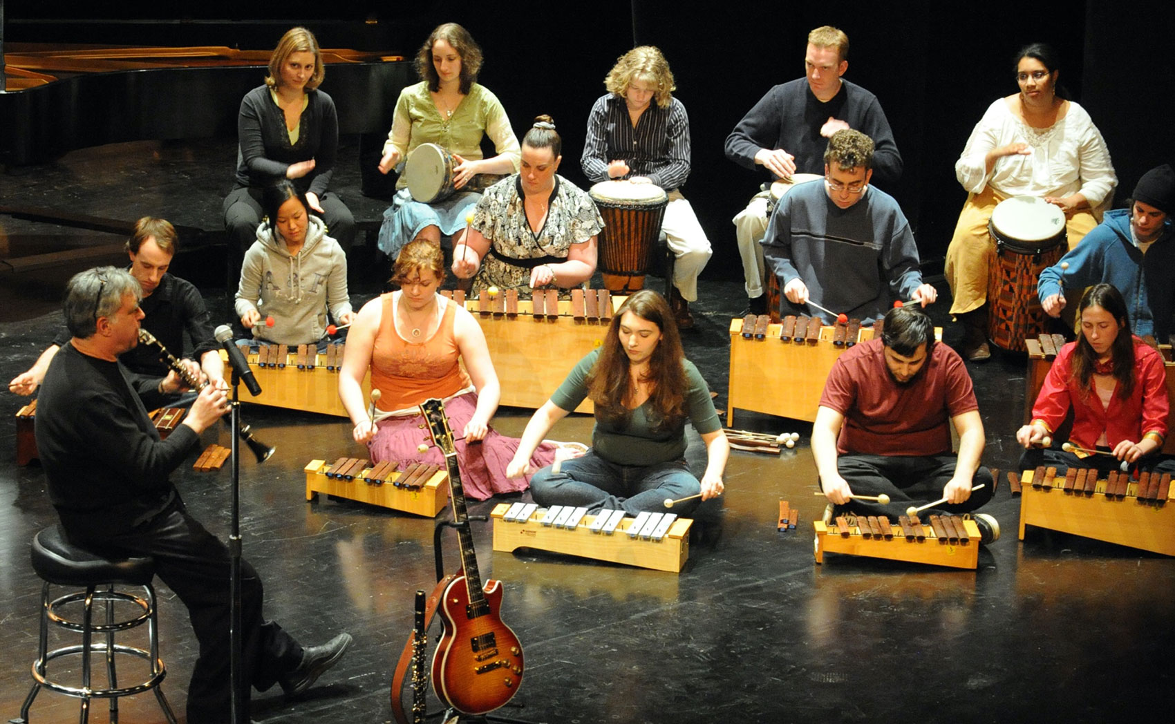 The Healing Arts Ensemble, lead by Dr. Glenn Smith at the center, gather for a relaxing music session.