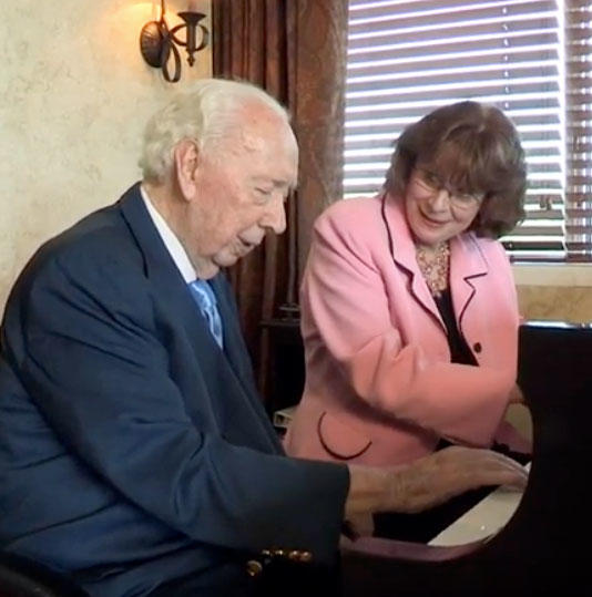 Sid Dewberry plays the piano with Mason' Linda Monson