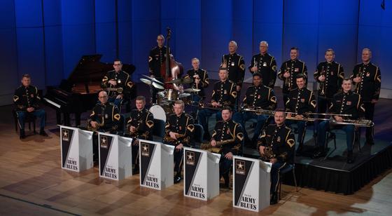 group shot of Army Blues holding instruments