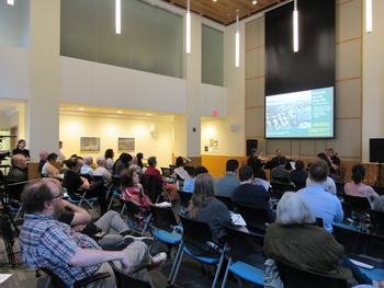 An audience watching a string quartet
