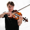 Patrick wearing black shirt holding his viola